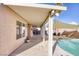 Covered patio, adjacent to pool, with room for seating at 2000 Golden Shadow Ct, Henderson, NV 89002