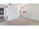 Well-lit bedroom featuring carpet floors and a large closet at 214 W Atlantic Ave, Henderson, NV 89015