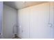 Small laundry area with hookups and storage at 214 W Atlantic Ave, Henderson, NV 89015