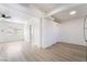 Bright living room with light wood flooring and ceiling fan at 214 W Atlantic Ave, Henderson, NV 89015