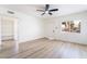 Spacious living room with light walls and wood-look floors at 214 W Atlantic Ave, Henderson, NV 89015