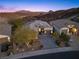 Luxury home with landscaped yard and driveway at 23 Via Tavolara, Henderson, NV 89011