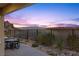 Landscaped backyard offering scenic views and a patio dining area at 23 Via Tavolara, Henderson, NV 89011