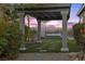 Relaxing backyard oasis with hot tub, pergola, and mountain views at 23 Via Tavolara, Henderson, NV 89011