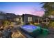 Entertain in this backyard with hot tub and pergola at 23 Via Tavolara, Henderson, NV 89011