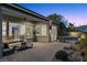 Relax on this large patio with views of the backyard at 23 Via Tavolara, Henderson, NV 89011