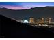 Spectacular nighttime view of the city lights and mountains at 23 Via Tavolara, Henderson, NV 89011