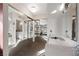 Bathroom area with large mirror, sliding doors and good lighting at 2353 Moorpark Way, Henderson, NV 89014