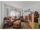 Bedroom with two armchairs, ottoman, and wood storage at 2353 Moorpark Way, Henderson, NV 89014