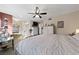 Bright bedroom with a comfortable bed and mirrored closet doors at 2353 Moorpark Way, Henderson, NV 89014