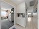 Hallway featuring tile floor and access to rooms in the home at 2353 Moorpark Way, Henderson, NV 89014