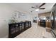 Bright kitchen with modern appliances, glass cabinets, and tile flooring at 2353 Moorpark Way, Henderson, NV 89014