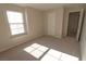 Bedroom with window seat and adjacent closet at 242 Botanic Gardens Dr, Las Vegas, NV 89148