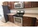 Kitchen with stainless steel appliances and granite countertops at 242 Botanic Gardens Dr, Las Vegas, NV 89148