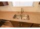 Double stainless steel sink with granite countertop at 242 Botanic Gardens Dr, Las Vegas, NV 89148