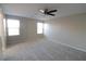 Main bedroom with ceiling fan and ample natural light at 242 Botanic Gardens Dr, Las Vegas, NV 89148