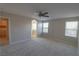 Large main bedroom with ceiling fan and attached bath at 242 Botanic Gardens Dr, Las Vegas, NV 89148