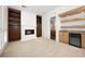 Spacious game room with wet bar, fireplace, and built-in shelving at 2475 Grassy Spring Pl, Las Vegas, NV 89135