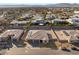 Aerial view of community, showcasing homes and mountain views at 2669 Pioneer Estates Ct, Las Vegas, NV 89117