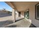 Covered patio with sliding glass doors leading to the interior at 2669 Pioneer Estates Ct, Las Vegas, NV 89117