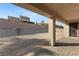 Covered patio with access to a large backyard at 2669 Pioneer Estates Ct, Las Vegas, NV 89117