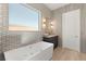 Spacious bathroom with soaking tub and dark wood vanity at 2669 Pioneer Estates Ct, Las Vegas, NV 89117