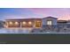 Stunning modern home with three-car garage and landscaped front yard at 2669 Pioneer Estates Ct, Las Vegas, NV 89117