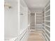 Spacious walk-in closet with built-in shelving and drawers at 2669 Pioneer Estates Ct, Las Vegas, NV 89117