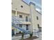 Two-story condo building with stairs and desert landscaping at 2725 S Nellis Blvd # 2036, Las Vegas, NV 89121