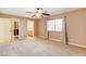 Spacious bedroom with ceiling fan and window coverings at 303 Glasgow St, Henderson, NV 89015