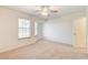 Bedroom with neutral walls, ceiling fan and carpet at 303 Glasgow St, Henderson, NV 89015