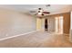 Bright bedroom with ceiling fan and walk-in closet at 303 Glasgow St, Henderson, NV 89015