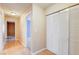 Light-filled hallway with built-in storage and access to bedrooms at 303 Glasgow St, Henderson, NV 89015