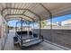 Covered RV parking with a metal carport structure at 303 Glasgow St, Henderson, NV 89015