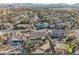 Aerial view showcasing a luxurious house with a large backyard, pool, and stunning mountain views at 328 Hedgehope Dr, Las Vegas, NV 89183