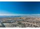 Aerial view of cityscape with mountains and desert landscape; shows surrounding area at 328 Hedgehope Dr, Las Vegas, NV 89183