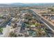 Aerial view of house with pool, and landscaped yard; located in a quiet residential neighborhood at 328 Hedgehope Dr, Las Vegas, NV 89183