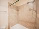 Updated bathroom with tile shower and tub at 328 Hedgehope Dr, Las Vegas, NV 89183