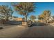 Gated community entrance with landscaping at 328 Hedgehope Dr, Las Vegas, NV 89183