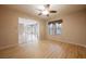 Living room with hardwood floors, ceiling fan and open floor plan at 328 Hedgehope Dr, Las Vegas, NV 89183