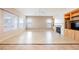 Living room with hardwood floors, fireplace and built-in shelves at 328 Hedgehope Dr, Las Vegas, NV 89183