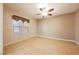 Bright living room with hardwood floors and ceiling fan at 328 Hedgehope Dr, Las Vegas, NV 89183