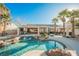 Inviting pool with rocks and a spacious patio at 328 Hedgehope Dr, Las Vegas, NV 89183