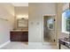 Elegant bathroom with a glass shower and vanity at 3495 Pama Ln, Las Vegas, NV 89120