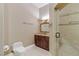 Elegant bathroom with granite vanity, a large shower, and neutral tile at 3495 Pama Ln, Las Vegas, NV 89120