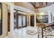 Elegant entryway with double doors and marble flooring at 3495 Pama Ln, Las Vegas, NV 89120