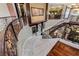 Elegant marble staircase with ornate railing; a stunning focal point at 3495 Pama Ln, Las Vegas, NV 89120