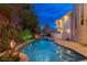 Stunning pool and patio with night lighting at 3495 Pama Ln, Las Vegas, NV 89120