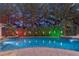 Pool at night with colorful lighting at 3495 Pama Ln, Las Vegas, NV 89120