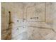 Large walk-in shower with tile surround at 3495 Pama Ln, Las Vegas, NV 89120